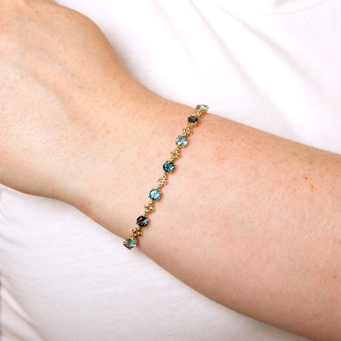 Ornate Blue Topaz Bracelet in 9ct Gold