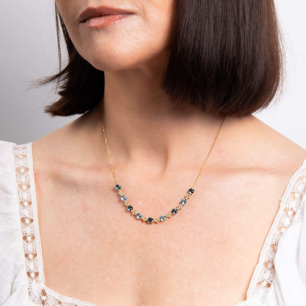 Ornate Blue Topaz Necklace in 9ct Gold